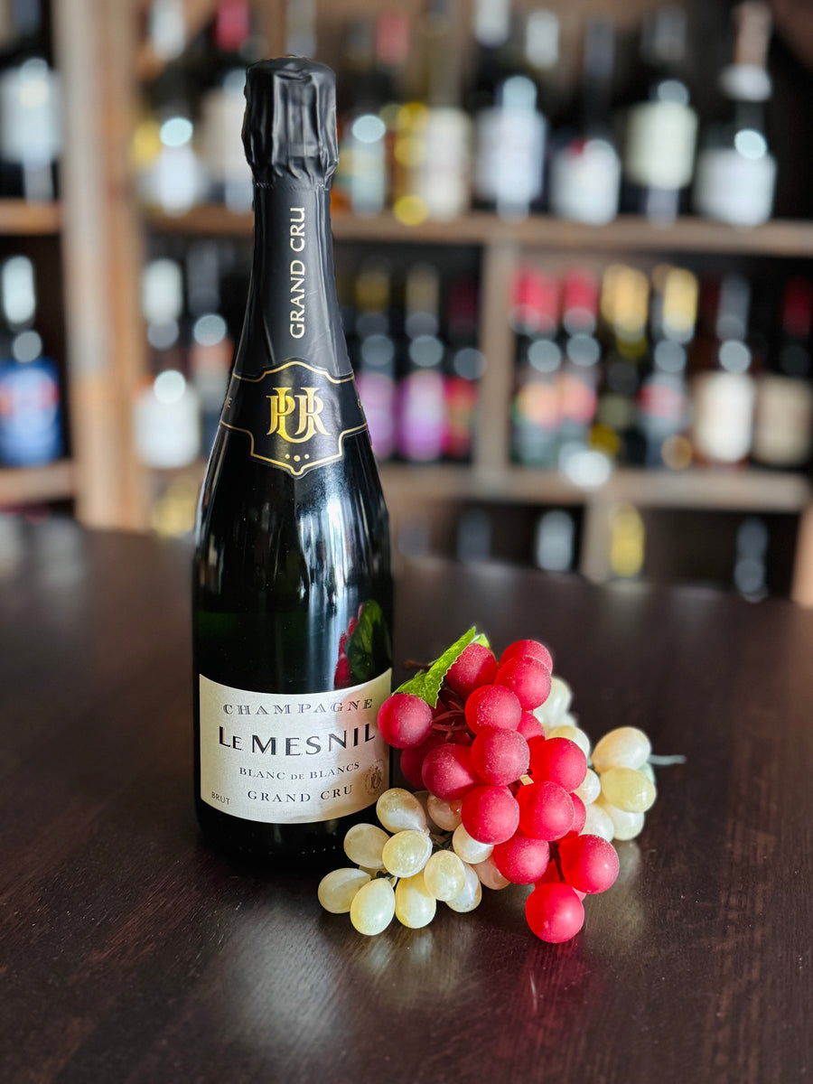A bottle of Le Mesnil Blanc de Blancs Grand Cru
