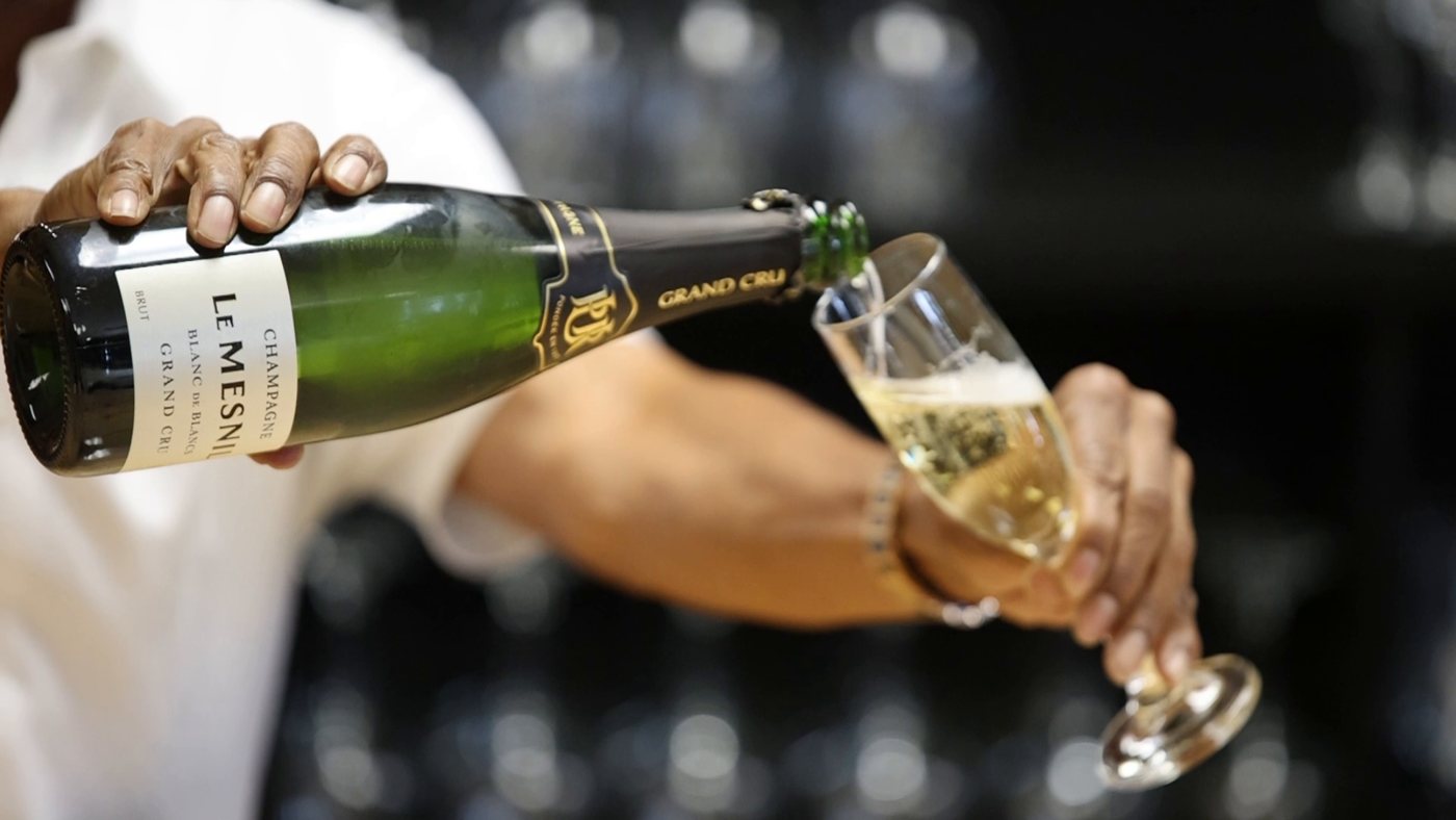 Champagne being poured into a glass